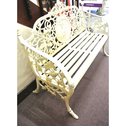 287 - Ornate cast iron garden bench with foliate, bird and figured decoration and shaped legs