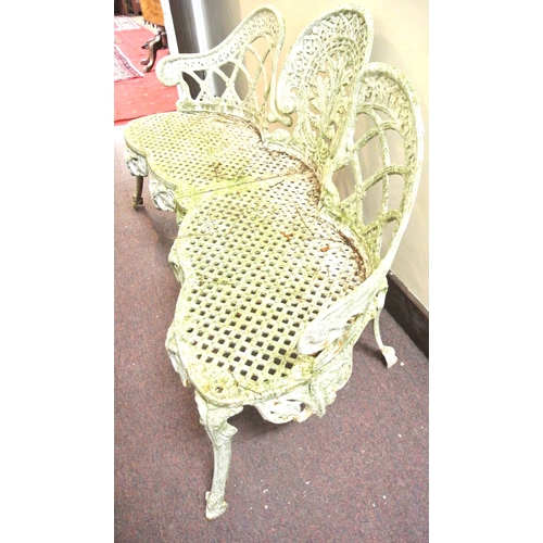 287 - Ornate cast iron garden bench with foliate, bird and figured decoration and shaped legs