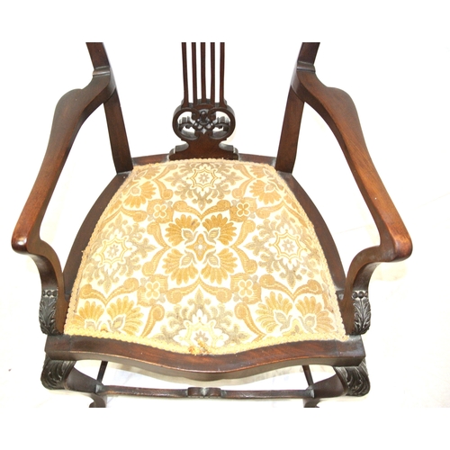 301 - Victorian mahogany open armchair with foliate carved pierces splat, shaped arms and seat, on cabriol... 