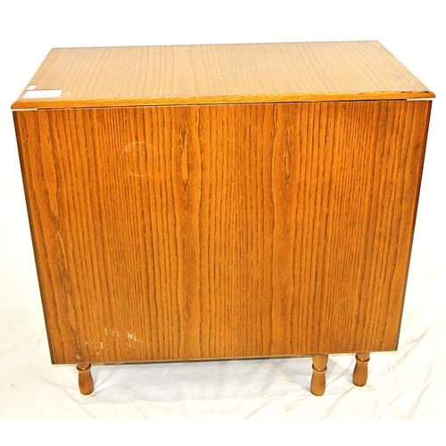 101 - Pine effect dining or kitchen table with drop leaves, gateleg support, with turned columns