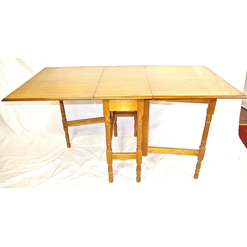 101 - Pine effect dining or kitchen table with drop leaves, gateleg support, with turned columns