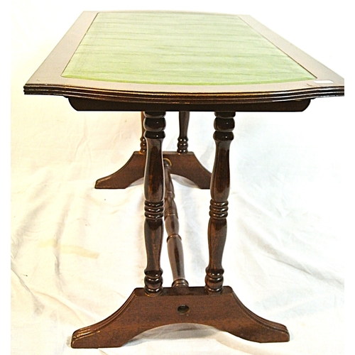 106 - Edwardian style oblong coffee table with bowed ends, and leatherette inset