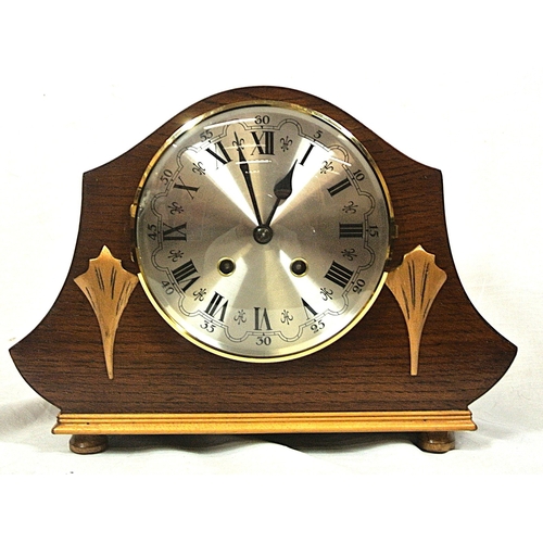 113 - Art Nouveau style domed mantle clock with brass framed silvered dial, on round feet