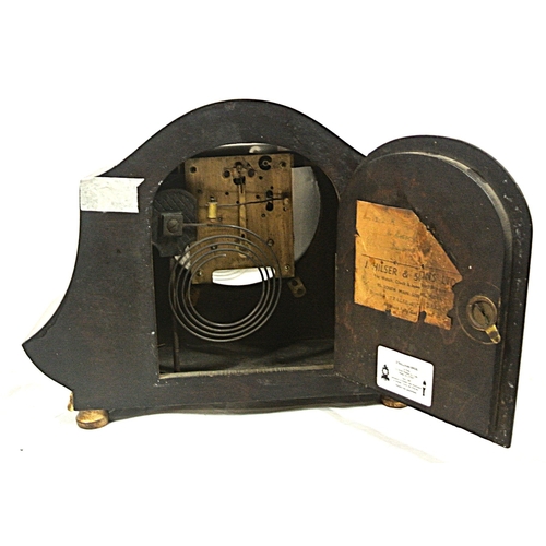 113 - Art Nouveau style domed mantle clock with brass framed silvered dial, on round feet