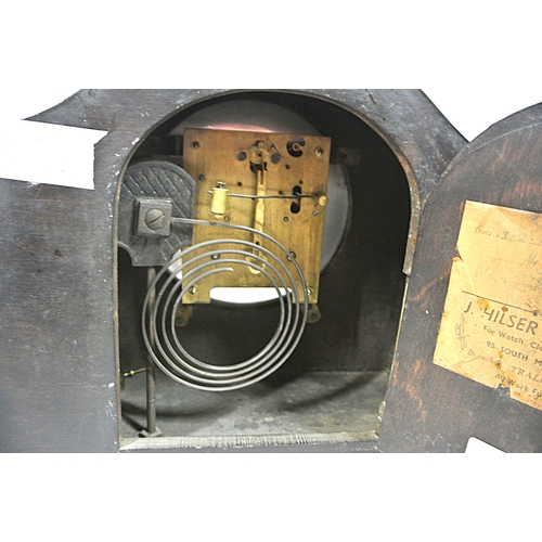 113 - Art Nouveau style domed mantle clock with brass framed silvered dial, on round feet