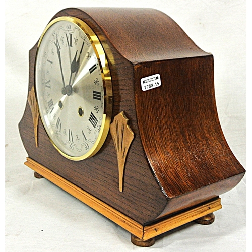 113 - Art Nouveau style domed mantle clock with brass framed silvered dial, on round feet