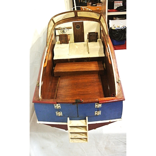 117 - Ornate model motor boat on fitted stand