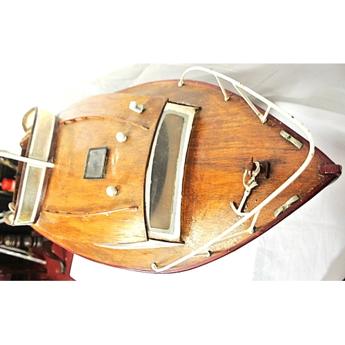 117 - Ornate model motor boat on fitted stand