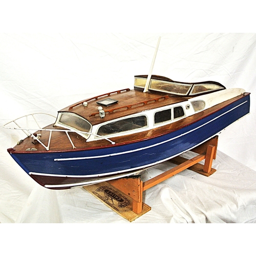 117 - Ornate model motor boat on fitted stand
