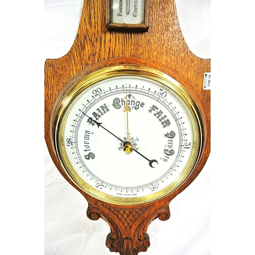138 - Edwardian style oak wheel barometer with brass framed dial and thermometer