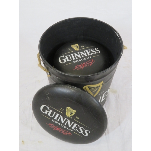 148 - Two Guinness barrel shaped pub stools or pails with cushioned tops
