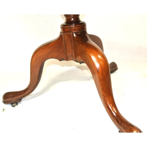 151 - Victorian style mahogany 3 tier round dumbwaiter with raised rims, revolving tiers, on hipped tripod... 