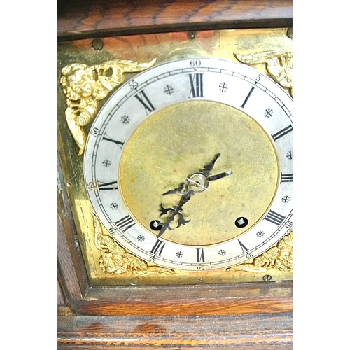 178 - Edwardian stye oak cased bracket clock with domed top, brass framed dial with ormolu mounts, on brac... 