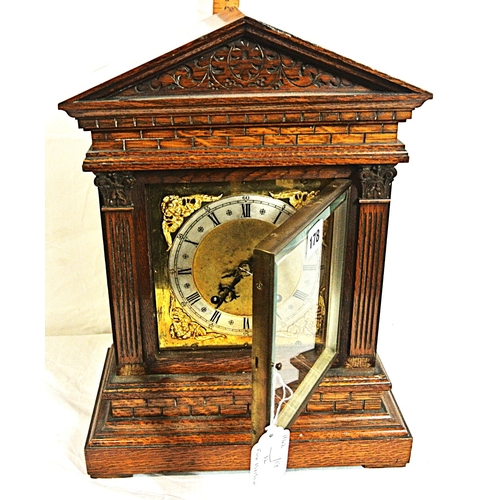 178 - Edwardian stye oak cased bracket clock with domed top, brass framed dial with ormolu mounts, on brac... 
