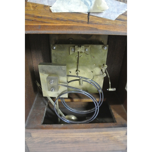 178 - Edwardian stye oak cased bracket clock with domed top, brass framed dial with ormolu mounts, on brac... 