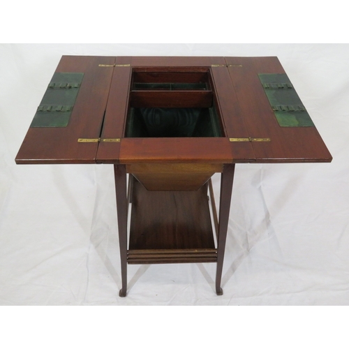 186 - Edwardian mahogany work or sewing table with fold over top, slide, materiel drop, on tapering legs