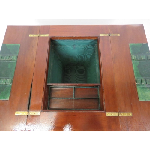 186 - Edwardian mahogany work or sewing table with fold over top, slide, materiel drop, on tapering legs