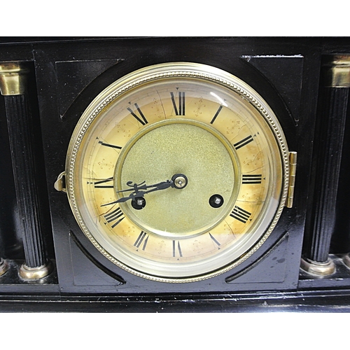 197 - French style mantle clock with angled top, round brass framed enamel dial, on bracket feet
