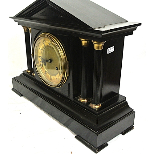 197 - French style mantle clock with angled top, round brass framed enamel dial, on bracket feet