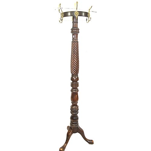 209 - Victorian mahogany round coat stand with lion mask hangers, twist reeded column, on hipped tripod wi... 