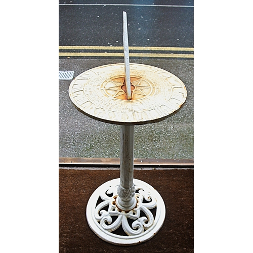 229 - Ornate cast iron sundial with pierced gnomon, on round base