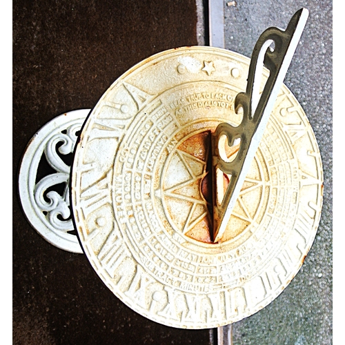 229 - Ornate cast iron sundial with pierced gnomon, on round base
