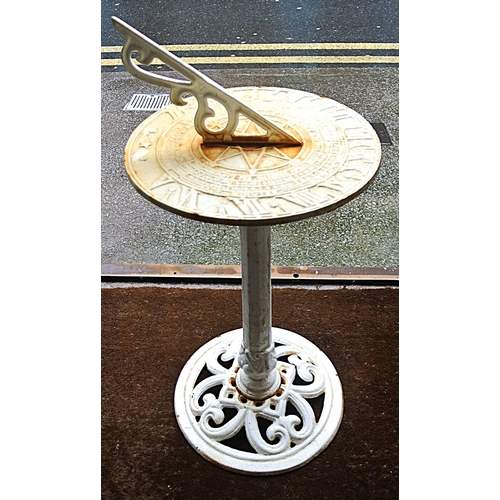 229 - Ornate cast iron sundial with pierced gnomon, on round base