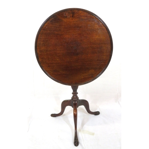 231 - Victorian mahogany lamp or wine table with round tip-up top, raised rim, on vase turned column with ... 