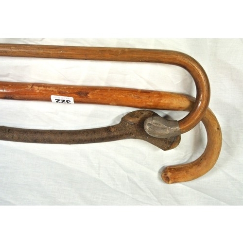 63 - Various assorted walking sticks with shaped handles