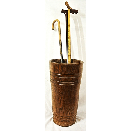 64 - Oak umbrella bucket of round tapering form