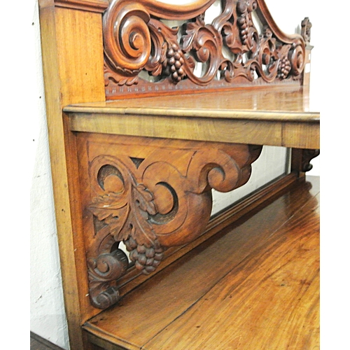 70 - Victorian mahogany 3 tier dumbwaiter with scroll and grape decorated pierced back and columns, 2 dra... 