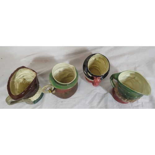 117 - 2 Royal Doulton and 2 Beswick toby jugs with shaped handles