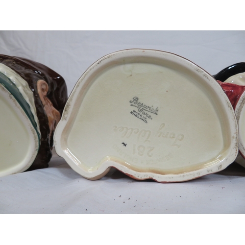 117 - 2 Royal Doulton and 2 Beswick toby jugs with shaped handles