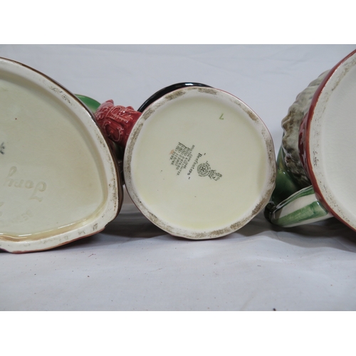 117 - 2 Royal Doulton and 2 Beswick toby jugs with shaped handles