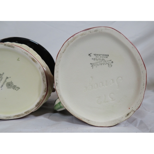 117 - 2 Royal Doulton and 2 Beswick toby jugs with shaped handles