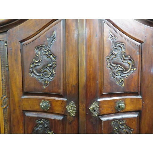 190 - Victorian walnut chest on chest with domed top, scroll decoration, serpentine panelled doors, shelve... 