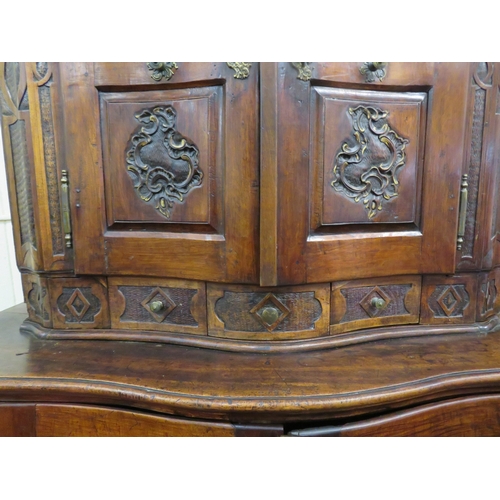 190 - Victorian walnut chest on chest with domed top, scroll decoration, serpentine panelled doors, shelve... 
