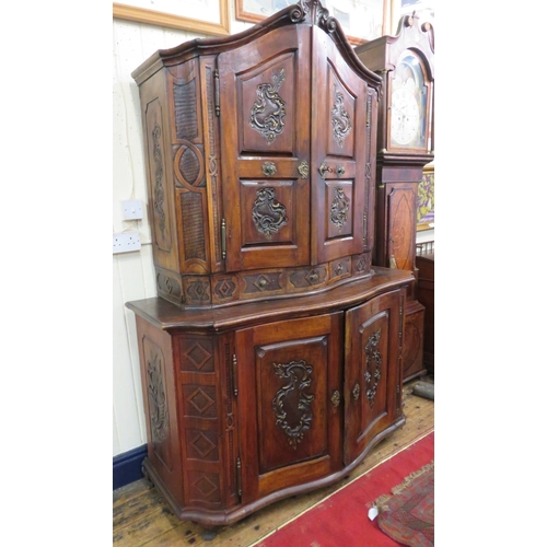 190 - Victorian walnut chest on chest with domed top, scroll decoration, serpentine panelled doors, shelve... 