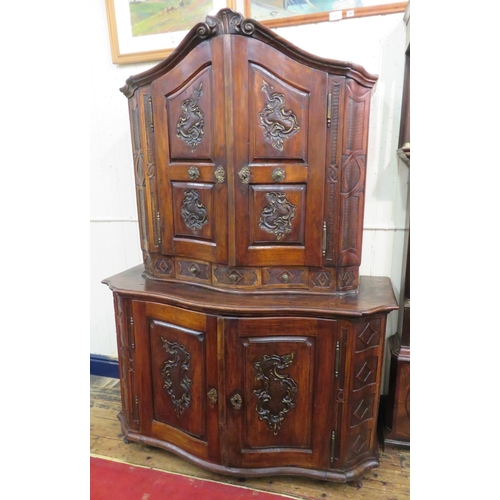190 - Victorian walnut chest on chest with domed top, scroll decoration, serpentine panelled doors, shelve... 