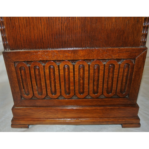 102 - Edwardian oak domed mantle clock with enamel dial and reeded decoration