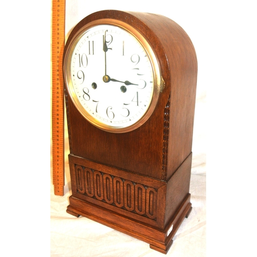 102 - Edwardian oak domed mantle clock with enamel dial and reeded decoration