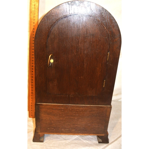 102 - Edwardian oak domed mantle clock with enamel dial and reeded decoration