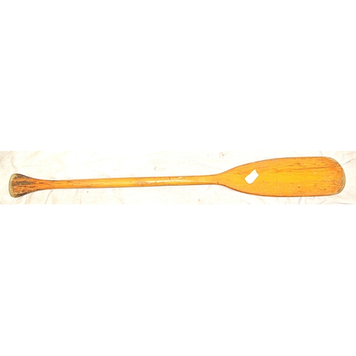 108 - Pair of inlaid pine oars and a paddle