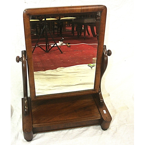 112 - Edwardian mahogany swivel mirror with shaped columns, lid, on bun feet