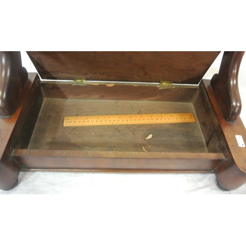 112 - Edwardian mahogany swivel mirror with shaped columns, lid, on bun feet