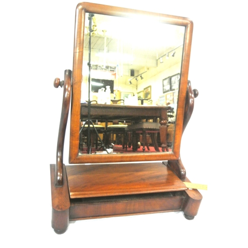 112 - Edwardian mahogany swivel mirror with shaped columns, lid, on bun feet