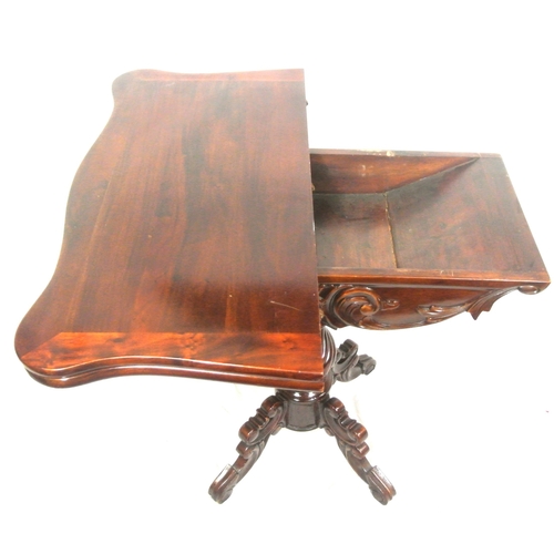 115 - Victorian design mahogany tea table with swivel fold over top, serpentine borders, foliate carved fr... 