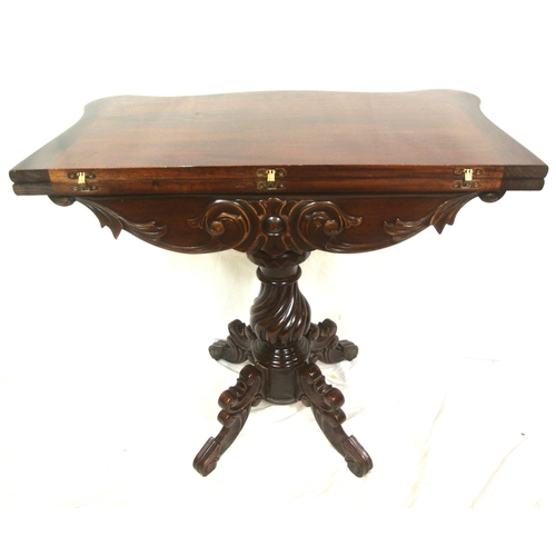 115 - Victorian design mahogany tea table with swivel fold over top, serpentine borders, foliate carved fr... 