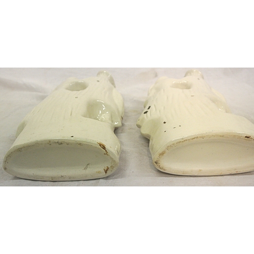118 - Pair of Staffordshire figures of a lady and gent, on oval bases