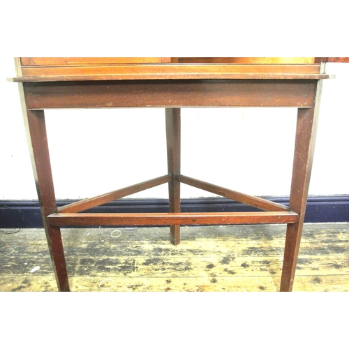 120 - Edwardian mahogany corner display cabinet with reeded frieze, glazed doors with shelved interior, on... 